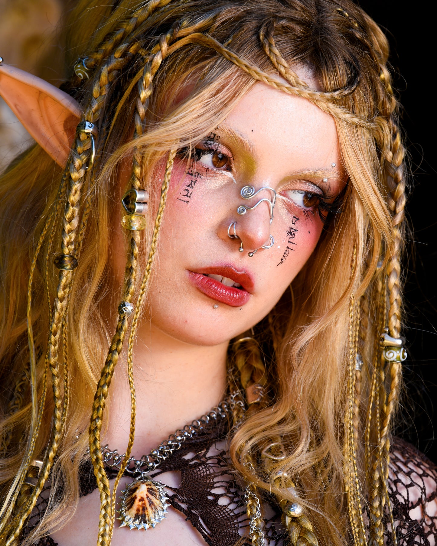 closeup of model wearing tidecaller necklace