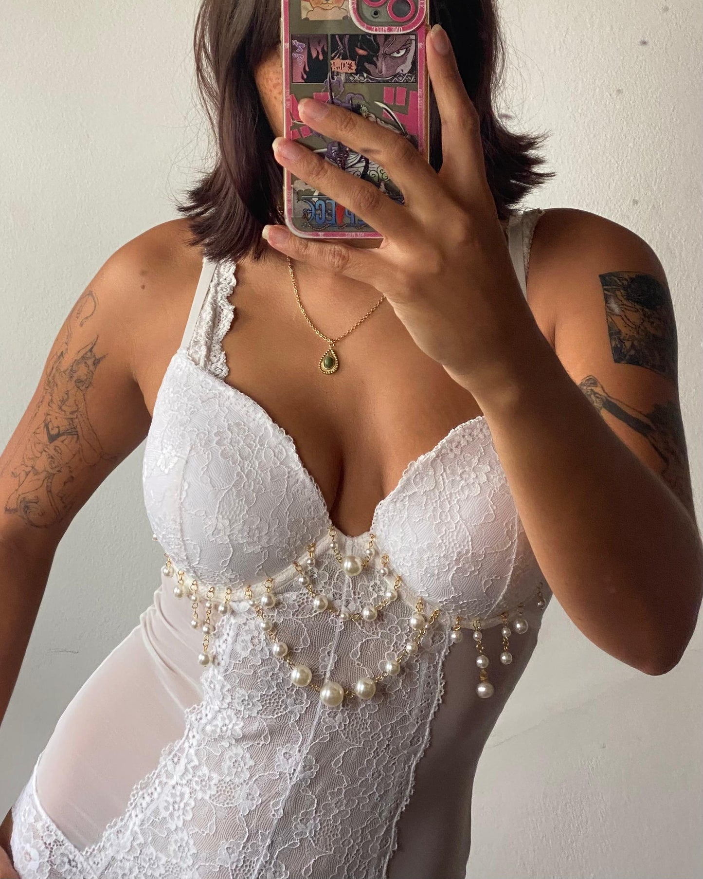 model wears white peal lace body